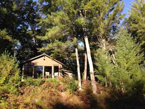 Listen To The Sweet Sounds Of The River At This Rustic Cabin In Michigan