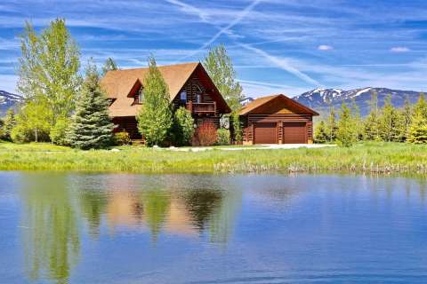 Escape To This Enchanting Airbnb In Idaho That Sits Right On A Brilliant Blue Pond