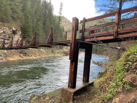 Walk Across A Foot Suspension Bridge On The St. Joe National Forest Trail 17 In Idaho