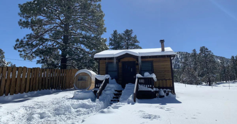 Cozying Up At This Charming Cabin Under A Blanket Of Snow Is The Ultimate Winter Retreat In Flagstaff, Arizona