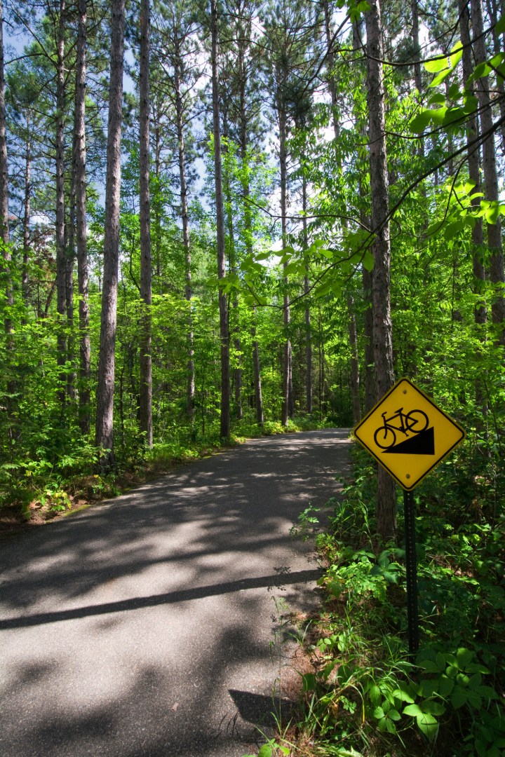 Downhill bike sign on trail in Itasca State Park, Northern Minnesota, USA