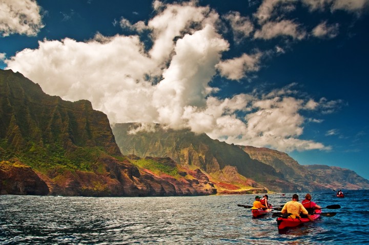 Kayaking Na Pali coast in Kauai, Hawaii.